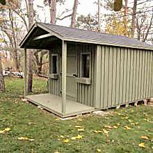 10 x 14 high board and batten with a 4 foot gable porch.